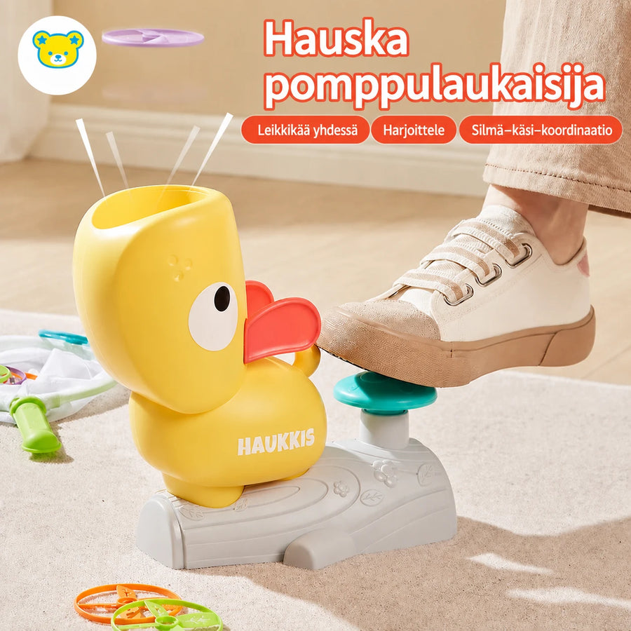 Polkaistava ankkalaukaisin lentokiekoilla lapsille